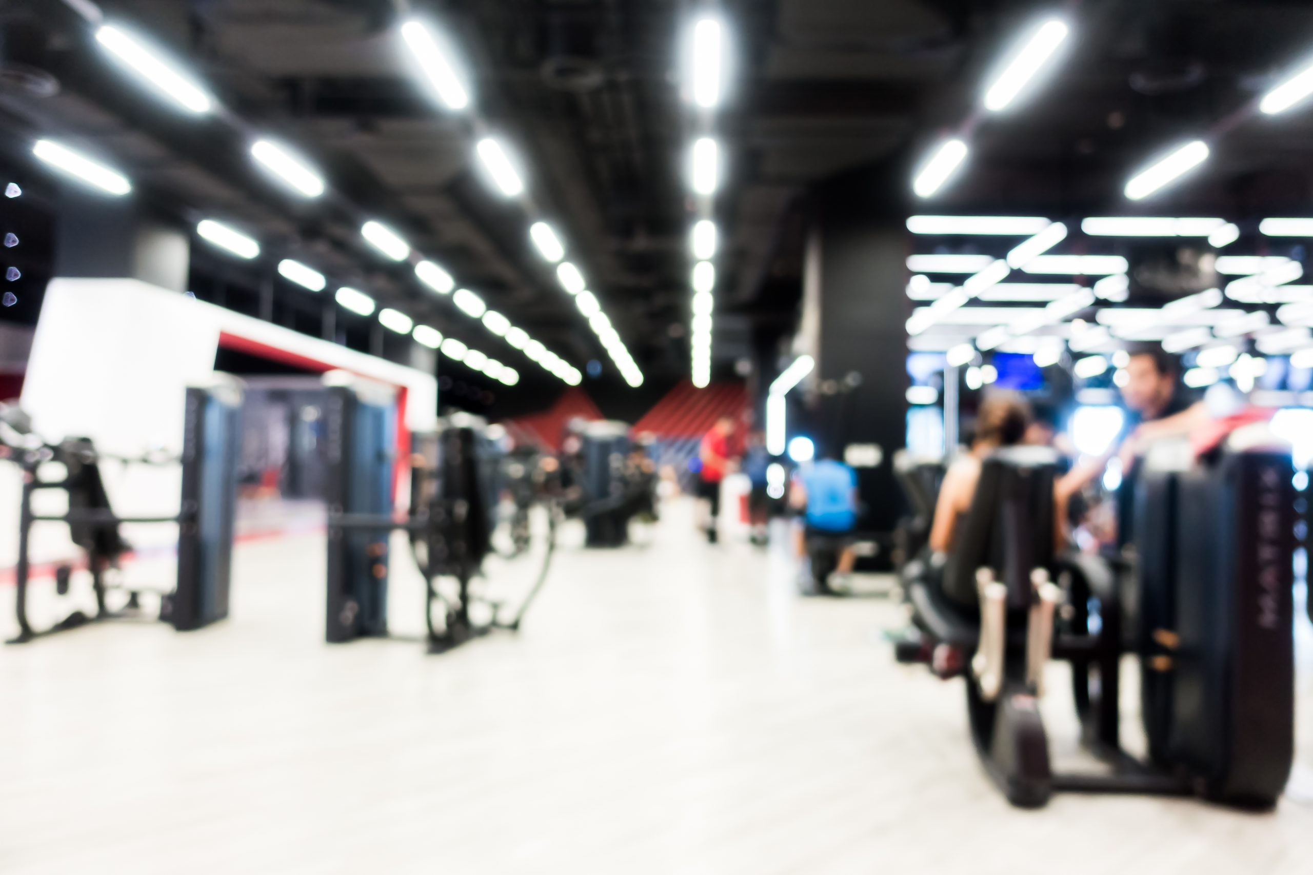 Abstract blur gym and fitness room interior for background